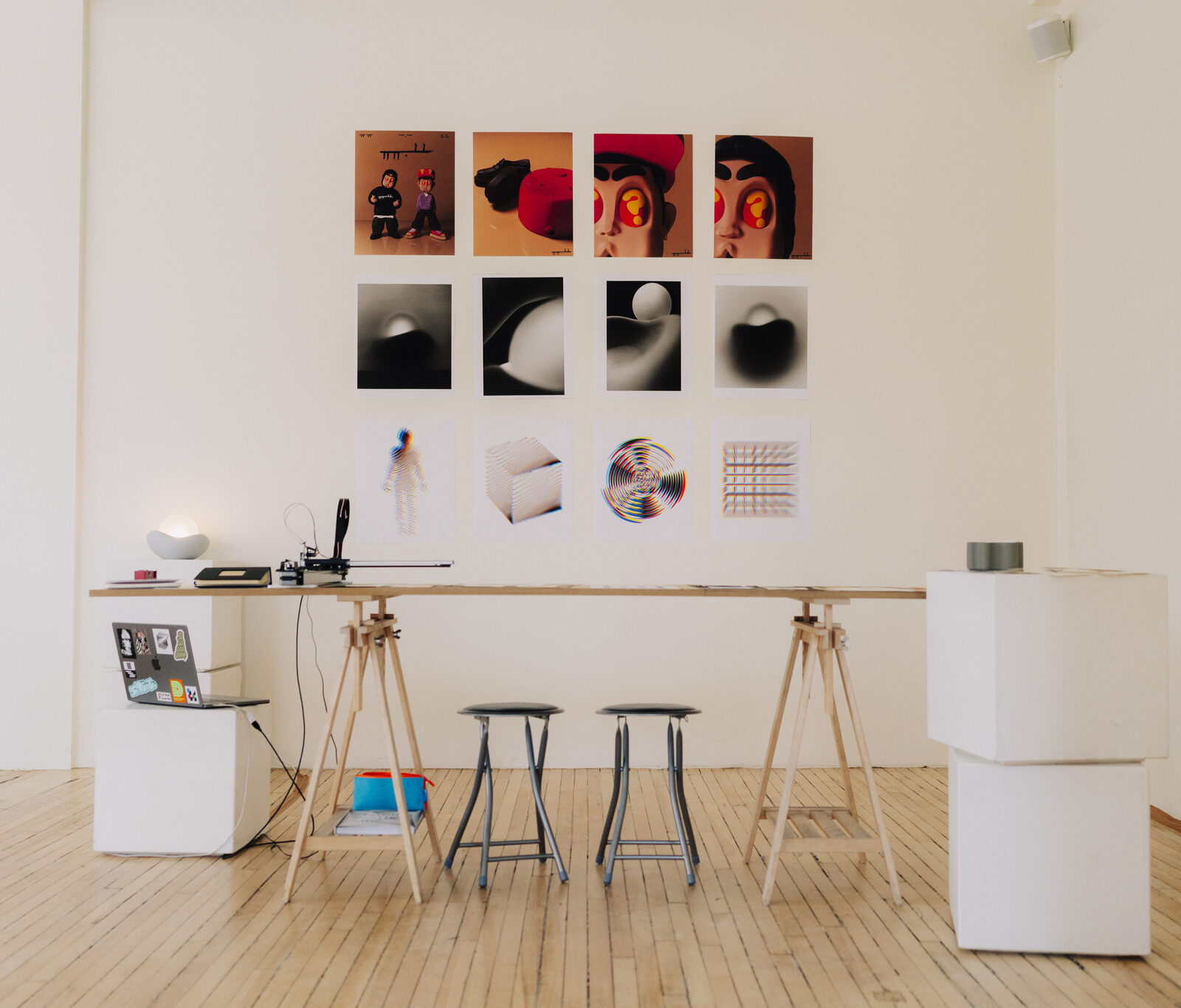 Overhead view of Open Studio figurine parts laid out on a worktable